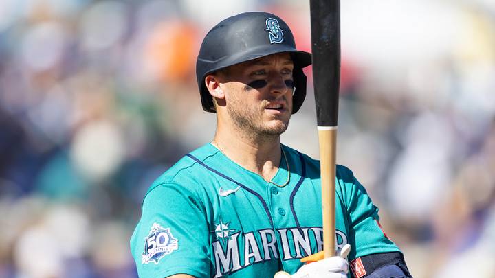 Feb 25, 2026; Surprise, Arizona, USA; Seattle Mariners catcher Andrew Knizner against the Kansas City Royals during a spring training game at Surprise Stadium. Mandatory Credit: Mark J. Rebilas-Imagn Images Feb 25, 2026; Surprise, Arizona, USA; Seattle Mariners catcher Andrew Knizner against the Kansas City Royals during a spring training game at Surprise Stadium. Mandatory Credit: Mark J. Rebilas-Imagn Images