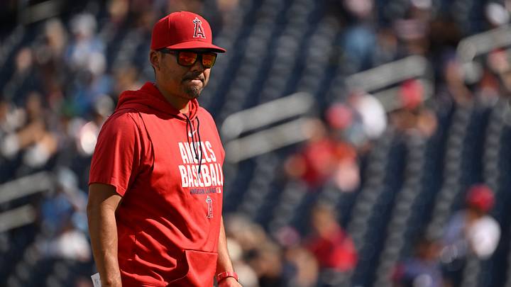 Sep 13, 2026; Washington, District of Columbia, USA;  Los Angeles Angels manager Kurt Suzuki (8) walks back to the dugout after a visit to the mound against the Washington Nationals during the seventh inning at Nationals Park.  Mandatory Credit: Rafael Suanes-Imagn Images
