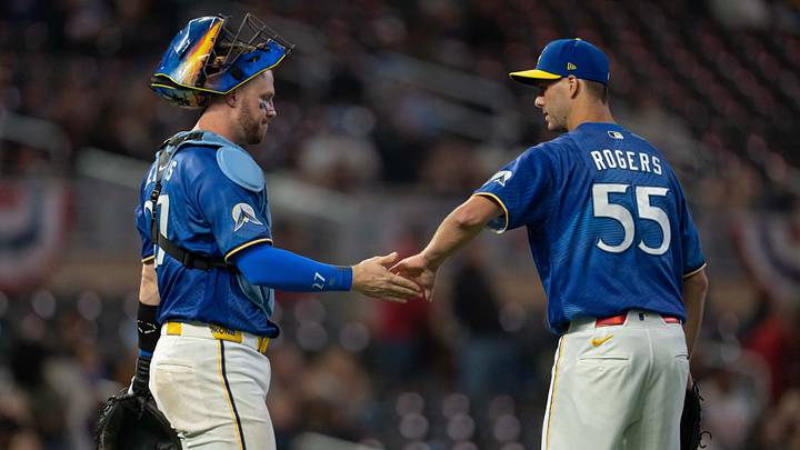 Minnesota Twins pitcher Taylor Rogers (55) celebrates with catcher Ryan Jeffers (27)  Credit: Jesse Johnson-Imagn Images