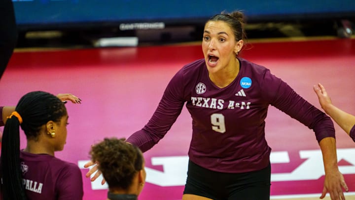 Dec 12, 2025; Lincoln, NE, USA; Texas A&M Aggies opposite Logan Lednicky (9) reacts after a point against the Louisville Cardinals during the fourth set at Bob Devaney Sports Center. Mandatory Credit: Dylan Widger-Imagn Images Dec 12, 2025; Lincoln, NE, USA; Texas A&M Aggies opposite Logan Lednicky (9) reacts after a point against the Louisville Cardinals during the fourth set at Bob Devaney Sports Center. Mandatory Credit: Dylan Widger-Imagn Images
