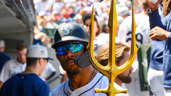 Seattle Mariners center fielder Julio Rodriguez (44) celebrates in the dugout after hitting a home run against the Baltimore Orioles during a game Thursday at T-Mobile Park.