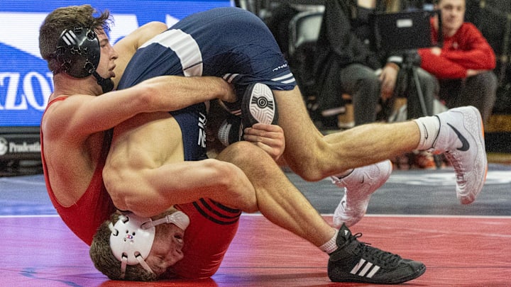 Penn State's Mitchell Mesenbrink wrestles Rutgers' Anthony White in a Big Ten dual match. 
