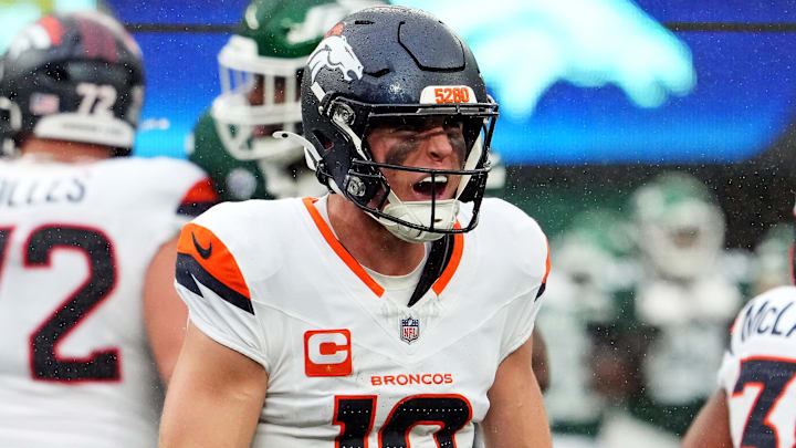Sep 29, 2024; East Rutherford, New Jersey, USA;  Denver Broncos quarterback Bo Nix (10) celebrates the win over against the New York Jets at MetLife Stadium. 
