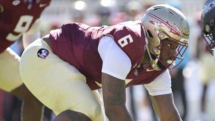 Nov 23, 2024; Tallahassee, Florida, USA; Florida State Seminoles defensive lineman Darrell Jackson Jr. (6) prepares for the snap during the first quarter against the Charleston Southern Buccaneers at Doak S. Campbell Stadium. Mandatory Credit: Melina Myers-Imagn Images