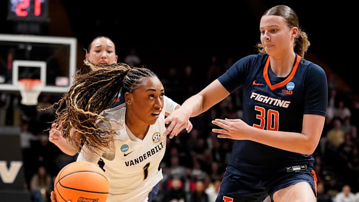Vanderbilt guard Mikayla Blakes (1) pushes past Illinois forward Cearah Parchment (30) during the first half of a second round NCAA college basketball tournament game at Memorial Gym in Nashville, Tenn., Monday, March 23, 2026.