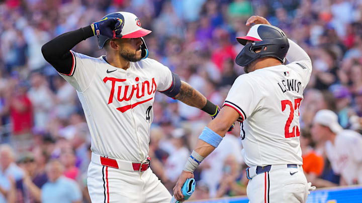 Jun 13, 2024; Minneapolis, Minnesota, USA; Minnesota Twins shortstop Carlos Correa (4) celebrates his home run with third base Royce Lewis (23) against the Oakland Athletics in the seventh inning at Target Field. Jun 13, 2024; Minneapolis, Minnesota, USA; Minnesota Twins shortstop Carlos Correa (4) celebrates his home run with third base Royce Lewis (23) against the Oakland Athletics in the seventh inning at Target Field.