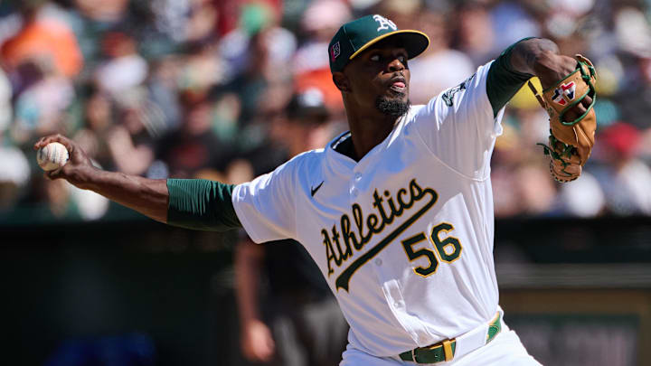 Aug 18, 2024; Oakland, California, USA; Oakland Athletics pitcher Dany Jimenez (56) throws a pitch against the San Francisco Giants during the tenth inning at Oakland-Alameda County Coliseum. Mandatory Credit: Robert Edwards-Imagn Images