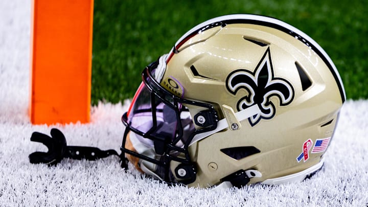 Sep 8, 2024; New Orleans, Louisiana, USA;  Detailed view of the New Orleans Saints football helmet before the game against the Carolina Panthers during the pregame at Caesars Superdome. Mandatory Credit: Stephen Lew-Imagn Images