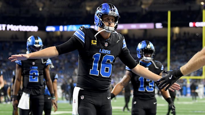 Sep 30, 2024; Detroit, Michigan, USA; Detroit Lions quarterback Jared Goff (16) greets his offensive lineman as they run onto the field for pregame warmups before their game against the Seattle Seahawks at Ford Field. Mandatory Credit: Lon Horwedel-Imagn Images
