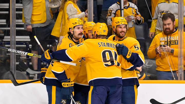 Oct 13, 2026; Nashville, Tennessee, USA; Nashville Predators center Ryan O'Reilly (90) celebrates with his teammates after scoring a goal against the Vegas Golden Knights during the first period at Bridgestone Arena. Mandatory Credit: Steve Roberts-Imagn Images Oct 13, 2026; Nashville, Tennessee, USA; Nashville Predators center Ryan O'Reilly (90) celebrates with his teammates after scoring a goal against the Vegas Golden Knights during the first period at Bridgestone Arena. Mandatory Credit: Steve Roberts-Imagn Images