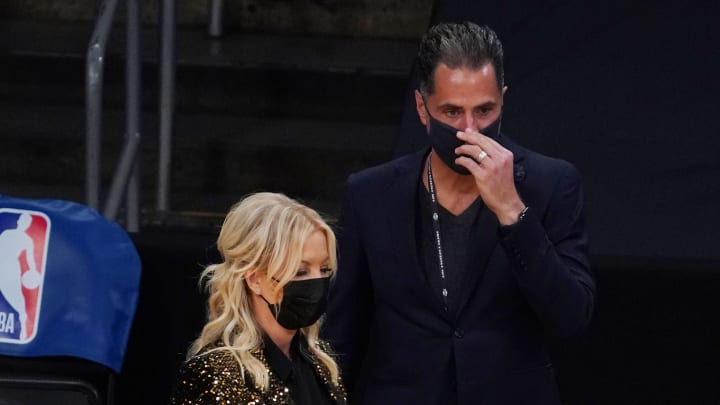 Dec 22, 2020; Los Angeles, California, USA; Los Angeles Lakers owner Jeanie Buss (left) and general manager Rob Pelinka wear face masks during a game against the LA Clippers at Staples Center. The Clippers defeated the Lakers. Mandatory Credit: Kirby Lee-USA TODAY Sports Dec 22, 2020; Los Angeles, California, USA; Los Angeles Lakers owner Jeanie Buss (left) and general manager Rob Pelinka wear face masks during a game against the LA Clippers at Staples Center. The Clippers defeated the Lakers. Mandatory Credit: Kirby Lee-USA TODAY Sports