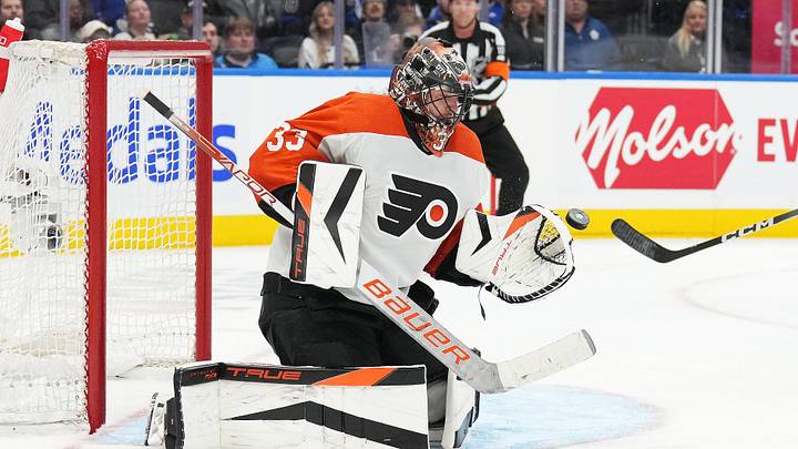 Feb 15, 2024; Toronto, Ontario, CAN; Philadelphia Flyers goaltender Samuel Ersson (33) makes a save against the Toronto Maple Leafs during the third period at Scotiabank Arena. Mandatory Credit: Nick Turchiaro-Imagn Images