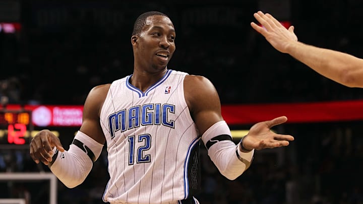 Orlando Magic center Dwight Howard (12) high fives during the second half against the Milwaukee Bucks at Amway Center. Orlando Magic defeated the Milwaukee Bucks 111-98.
