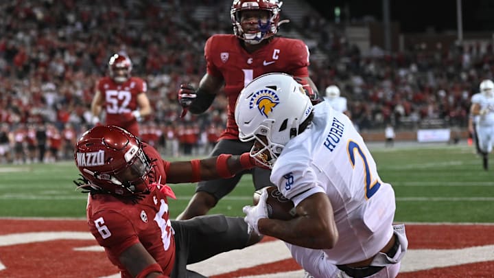 Sep 20, 2024; Pullman, Washington, USA; San Jose State Spartans wide receiver TreyShun Hurry (2) catches the ball for a touchdown against Washington State Cougars defensive back Adrian Wilson (6) in the second half at Gesa Field at Martin Stadium. Mandatory Credit: James Snook-Imagn Images Sep 20, 2024; Pullman, Washington, USA; San Jose State Spartans wide receiver TreyShun Hurry (2) catches the ball for a touchdown against Washington State Cougars defensive back Adrian Wilson (6) in the second half at Gesa Field at Martin Stadium. Mandatory Credit: James Snook-Imagn Images