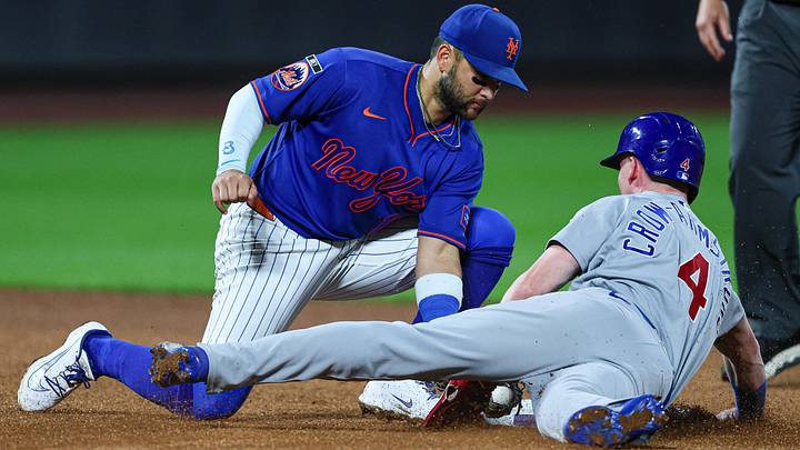 Jun 23, 2026; New York City, New York, USA; Chicago Cubs center fielder Pete Crow-Armstrong (4) slides through second base as New York Mets third baseman Bo Bichette (19) tags during the seventh inning at Citi Field. Review determined Crow-Armstrong was out. Mandatory Credit: Vincent Carchietta-Imagn Images Jun 23, 2026; New York City, New York, USA; Chicago Cubs center fielder Pete Crow-Armstrong (4) slides through second base as New York Mets third baseman Bo Bichette (19) tags during the seventh inning at Citi Field. Review determined Crow-Armstrong was out. Mandatory Credit: Vincent Carchietta-Imagn Images