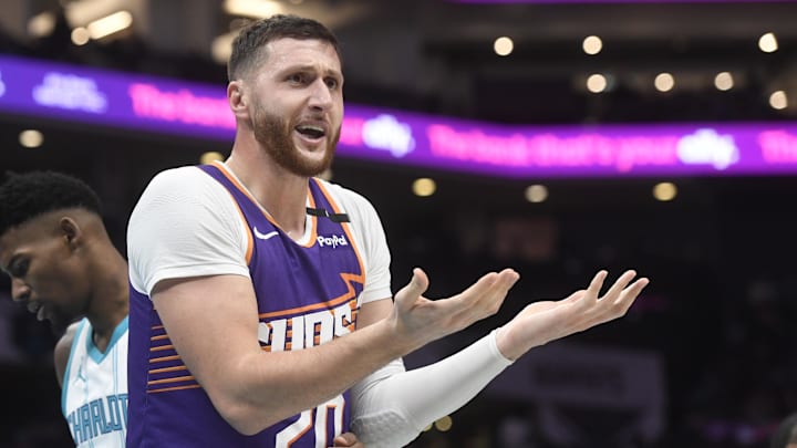Jan 7, 2025; Charlotte, North Carolina, USA;  Phoenix Suns center Jusuf Nurkic (20) reacts after being called on a foul during the second half against the Charlotte Hornets at the Spectrum Center. Mandatory Credit: Sam Sharpe-Imagn Images