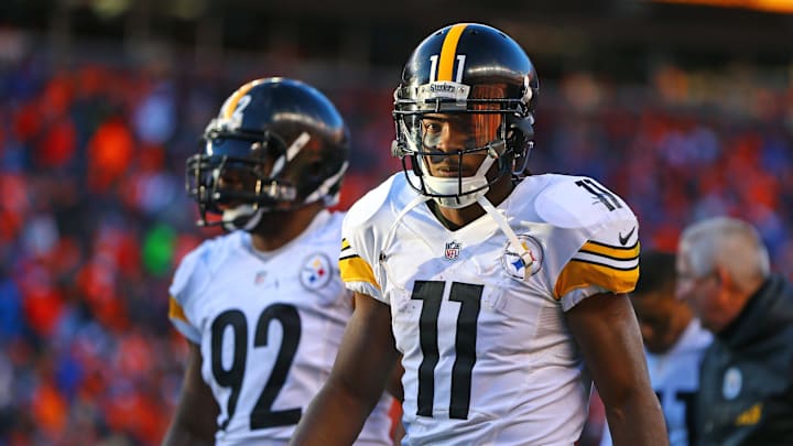 Jan 17, 2016; Denver, CO, USA; Pittsburgh Steelers wide receiver Markus Wheaton (11) and linebacker James Harrison (92) against the Denver Broncos during the AFC Divisional round playoff game at Sports Authority Field at Mile High. Mandatory Credit: Mark J. Rebilas-Imagn Images