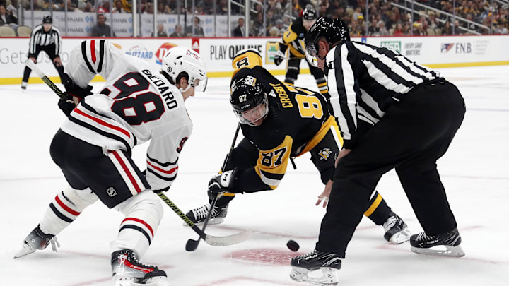 Oct 10, 2023; Pittsburgh, Pennsylvania, USA; Chicago Blackhawks center Connor Bedard (98) and Pittsburgh Penguins center Sidney Crosby (87) take a face-off during the third period at the PPG Paints Arena. Chicago won 4-2.  Mandatory Credit: Charles LeClaire-Imagn Images Oct 10, 2023; Pittsburgh, Pennsylvania, USA; Chicago Blackhawks center Connor Bedard (98) and Pittsburgh Penguins center Sidney Crosby (87) take a face-off during the third period at the PPG Paints Arena. Chicago won 4-2.  Mandatory Credit: Charles LeClaire-Imagn Images