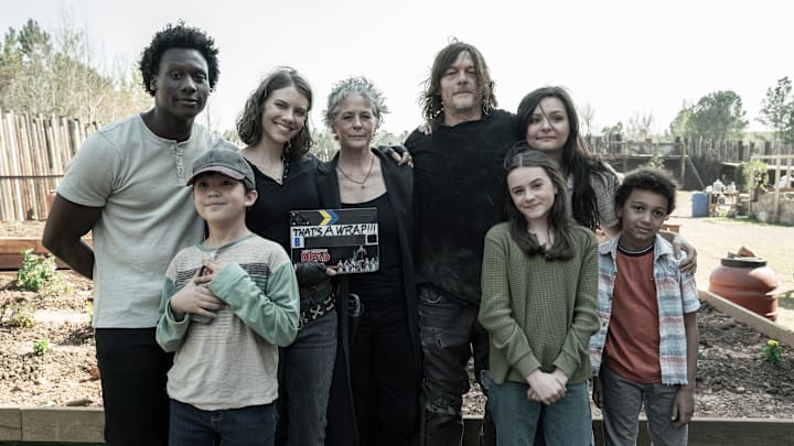 BTS, Okea Eme-Akwari as Elijah, Kien Michael Spiller as Hershel, Lauren Cohan as Maggie Rhee, Melissa McBride as Carol Peletier, Norman Reedus as Daryl Dixon, Cassady McClincy as Lydia, Cailey Fleming as Judith, Anthony Azor as RJ - The Walking Dead _ Season 11, Episode 24 - Photo Credit: Jace Downs/AMC