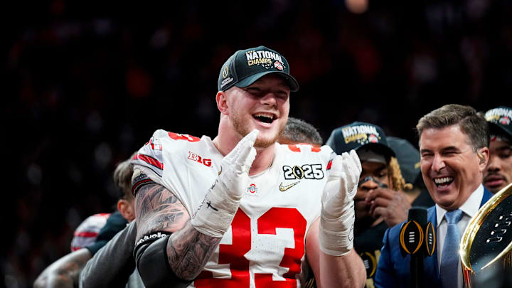 Ohio State Buckeyes defensive end Jack Sawyer (33) celebrates after defeating Notre Dame Fighting Irish in the College Football Playoff championship game at Mercedes-Benz Stadium in Atlanta on Jan. 21, 2025.