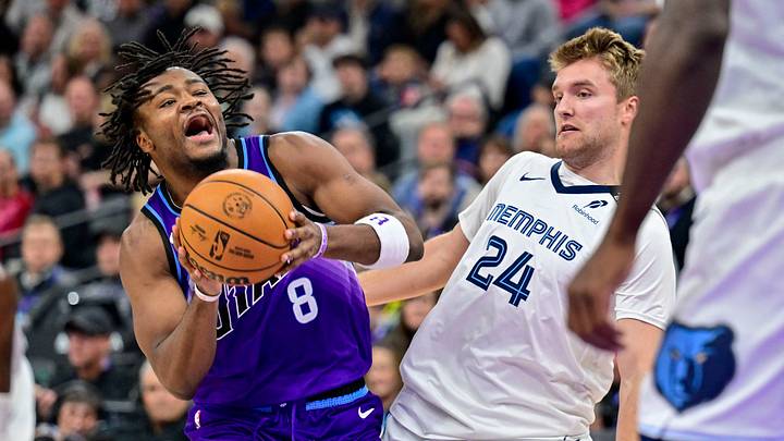 Oct 26, 2026; Salt Lake City, Utah, USA;  Utah Jazz guard Isaiah Collier (8) and Memphis Grizzlies guard Cam Spencer (24) collide during the second half at Delta Center.  Mandatory Credit: Peter Creveling-Imagn Images