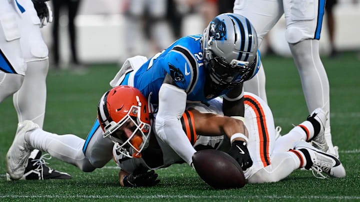 Aug 8, 2025; Charlotte, North Carolina, USA; DUPLICATE***Cleveland Browns wide receiver Luke Floriea (37)***Cleveland Browns cornerback Dom Jones (37) and Carolina Panthers safety Nick Scott (21) reach for a ball that was later ruled down by contact in the second quarter at Bank of America Stadium. Mandatory Credit: Bob Donnan-Imagn Images