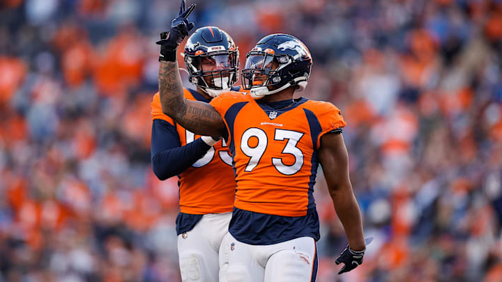 Dec 12, 2021; Denver, Colorado, USA; Denver Broncos defensive end Dre'Mont Jones (93) celebrates with linebacker Bradley Chubb (55) after a play in the third quarter against the Detroit Lions at Empower Field at Mile High. Mandatory Credit: Isaiah J. Downing-Imagn Images Dec 12, 2021; Denver, Colorado, USA; Denver Broncos defensive end Dre'Mont Jones (93) celebrates with linebacker Bradley Chubb (55) after a play in the third quarter against the Detroit Lions at Empower Field at Mile High. Mandatory Credit: Isaiah J. Downing-Imagn Images