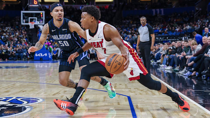 Jan 21, 2024; Orlando, Florida, USA; Miami Heat guard Kyle Lowry (7) drives around Orlando Magic guard Cole Anthony (50) during the second quarter at Amway Center. Mandatory Credit: Mike Watters-Imagn Images