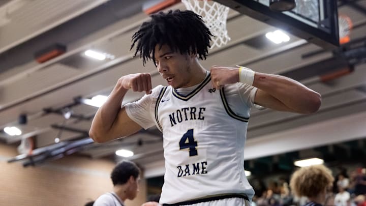 Jan 4, 2025; Gilbert, AZ, USA; Notre Dame High School (CA) forward Tyran Stokes (4) flexes as he celebrates a shot against Sandra Day O'Connor (AZ) during the Hoophall West High School Invitational at Highland High School. Mandatory Credit: Mark J. Rebilas-Imagn Images