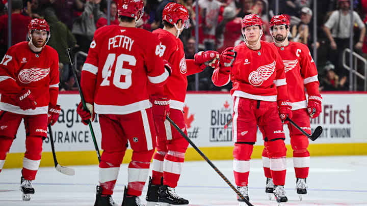Dec 18, 2024; Detroit, Michigan, USA; Detroit Red Wings right wing Patrick Kane (88) celebrates with teammates after scoring the game winning goal during the third period against the Philadelphia Flyers at Little Caesars Arena. Mandatory Credit: Tim Fuller-Imagn Images