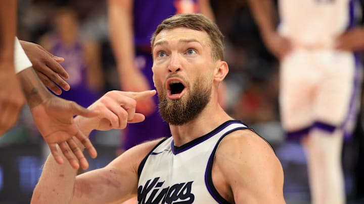 Mar 14, 2025; Phoenix, Arizona, USA; Sacramento Kings forward Domantas Sabonis (11) against the Phoenix Suns at Footprint Center. Mandatory Credit: Mark J. Rebilas-Imagn Images