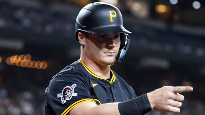May 27, 2025; Phoenix, Arizona, USA; Pittsburgh Pirates catcher Henry Davis celebrates with teammates after hitting a two run home run in the sixth inning against the Arizona Diamondbacks at Chase Field. Mandatory Credit: Mark J. Rebilas-Imagn Images