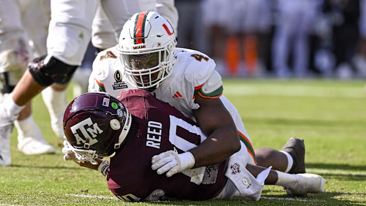 Dec 20, 2025; College Station, TX, USA; Miami Hurricanes defensive lineman Rueben Bain Jr. (4) sacks Texas A&M Aggies quarterback Marcel Reed (10) during the game between the Aggies and the Hurricanes at Kyle Field. Mandatory Credit: Jerome Miron-Imagn Images
