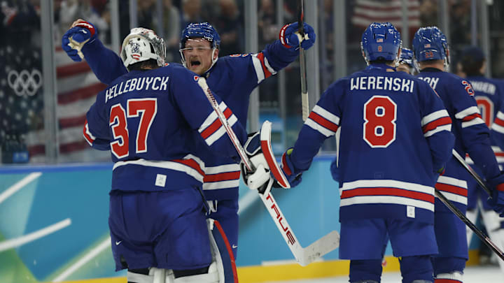 Feb 18, 2026; Milan, Italy; Connor Hellebuyck (37) of the United States and Jack Eichel (9) of the United States celebrate after defeating Sweden in a men's ice hockey quarterfinal during the Milano Cortina 2026 Olympic Winter Games at Milano Santagiulia Ice Hockey Arena. Mandatory Credit: Geoff Burke-Imagn Images Feb 18, 2026; Milan, Italy; Connor Hellebuyck (37) of the United States and Jack Eichel (9) of the United States celebrate after defeating Sweden in a men's ice hockey quarterfinal during the Milano Cortina 2026 Olympic Winter Games at Milano Santagiulia Ice Hockey Arena. Mandatory Credit: Geoff Burke-Imagn Images