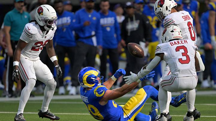Oct 18, 2026; Inglewood, California, USA; Los Angeles Rams tight end Tyler Higbee (89) fumbles the ball against Arizona Cardinals safety Andrew Wingard (28) and safety Budda Baker (3) and linebacker Cody Simon (0) in the fourth quarter at SoFi Stadium. Mandatory Credit: Jayne Kamin-Oncea-Imagn Images Oct 18, 2026; Inglewood, California, USA; Los Angeles Rams tight end Tyler Higbee (89) fumbles the ball against Arizona Cardinals safety Andrew Wingard (28) and safety Budda Baker (3) and linebacker Cody Simon (0) in the fourth quarter at SoFi Stadium. Mandatory Credit: Jayne Kamin-Oncea-Imagn Images