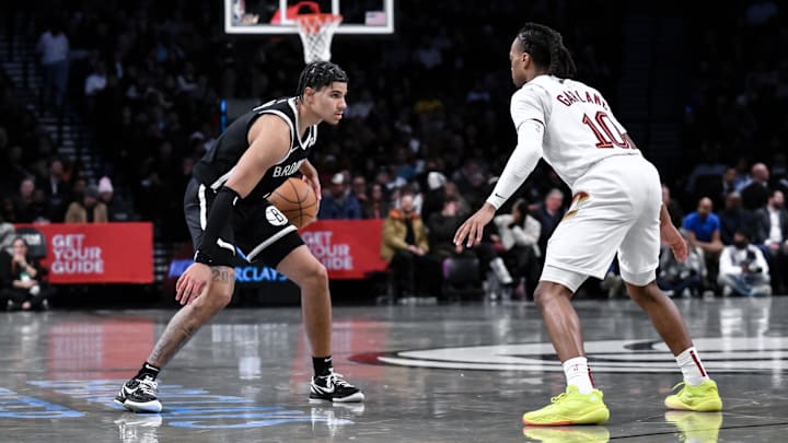 Feb 20, 2025; Brooklyn, New York, USA; Brooklyn Nets guard Killian Hayes (7) sets the play while being defended by Cleveland Cavaliers guard Darius Garland (10) during the first half at Barclays Center. Mandatory Credit: John Jones-Imagn Images Feb 20, 2025; Brooklyn, New York, USA; Brooklyn Nets guard Killian Hayes (7) sets the play while being defended by Cleveland Cavaliers guard Darius Garland (10) during the first half at Barclays Center. Mandatory Credit: John Jones-Imagn Images