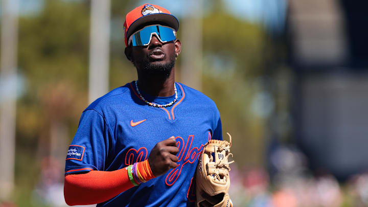 Feb 24, 2026; Port St. Lucie, Florida, USA; New York Mets shortstop Ronny Mauricio (0) returns to the dugout against the Houston Astros during the first inning at Clover Park. Mandatory Credit: Sam Navarro-Imagn Images