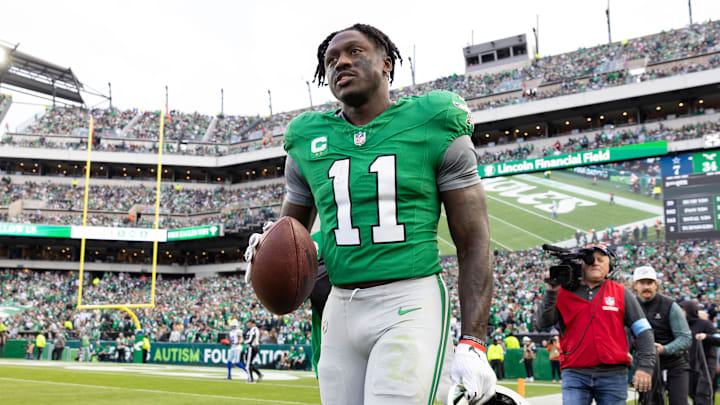 Dec 29, 2024; Philadelphia, Pennsylvania, USA; Philadelphia Eagles wide receiver A.J. Brown (11) carries his touchdown ball back to quarterback Tanner McKee (not pictured) during the third quarter against the Dallas Cowboys at Lincoln Financial Field. Mandatory Credit: Bill Streicher-Imagn Images Dec 29, 2024; Philadelphia, Pennsylvania, USA; Philadelphia Eagles wide receiver A.J. Brown (11) carries his touchdown ball back to quarterback Tanner McKee (not pictured) during the third quarter against the Dallas Cowboys at Lincoln Financial Field. Mandatory Credit: Bill Streicher-Imagn Images