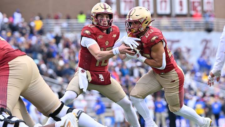 Oct 17, 2026; Chestnut Hill, MA, USA; Boston College Eagles quarterback Mason McKenzie (10) hands the ball to running back Evan Dickens (23) for a touchdown against the Pittsburgh Panthers during the second half at Alumni Stadium. Mandatory Credit: Eric Canha-Imagn Images Oct 17, 2026; Chestnut Hill, MA, USA; Boston College Eagles quarterback Mason McKenzie (10) hands the ball to running back Evan Dickens (23) for a touchdown against the Pittsburgh Panthers during the second half at Alumni Stadium. Mandatory Credit: Eric Canha-Imagn Images