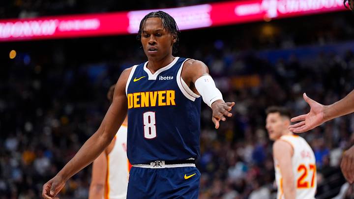 Jan 9, 2026; Denver, Colorado, USA; Denver Nuggets guard Peyton Watson (8) reacts during a timeout in the first quarter against the Atlanta Hawks at Ball Arena. Mandatory Credit: Ron Chenoy-Imagn Images