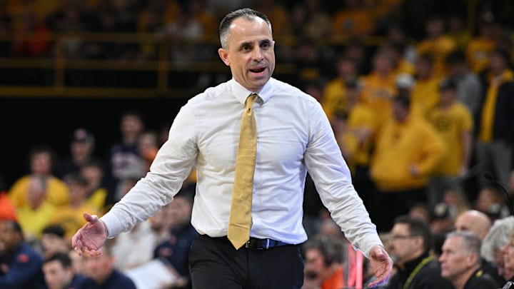 Iowa Hawkeyes head coach Ben McCollum 