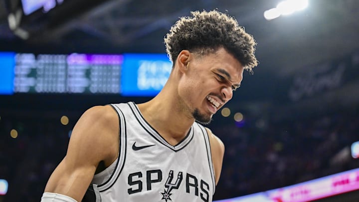 Nov 26, 2024; Salt Lake City, Utah, USA; San Antonio Spurs forward/center Victor Wembanyama (1) reacts after a collision with Utah Jazz forward/center Lauri Markkanen (not pictured) during the second half at Delta Center. Mandatory Credit: Christopher Creveling-Imagn Images