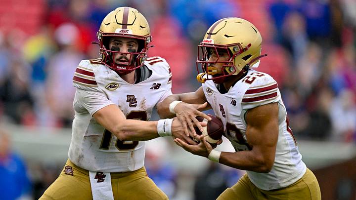 Oct 3, 2026; Dallas, Texas, USA; Boston College Eagles quarterback Mason McKenzie (10) hands the ball off to running back Evan Dickens (23) during the second half against the SMU Mustangs at Gerald J. Ford Stadium. Mandatory Credit: Jerome Miron-Imagn Images Oct 3, 2026; Dallas, Texas, USA; Boston College Eagles quarterback Mason McKenzie (10) hands the ball off to running back Evan Dickens (23) during the second half against the SMU Mustangs at Gerald J. Ford Stadium. Mandatory Credit: Jerome Miron-Imagn Images