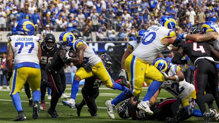 Sep 7, 2025; Inglewood, California, USA; Los Angeles Rams running back Kyren Williams (23) scores a touchtown during the second quarter at SoFi Stadium. Mandatory Credit: Kirby Lee-Imagn Images
