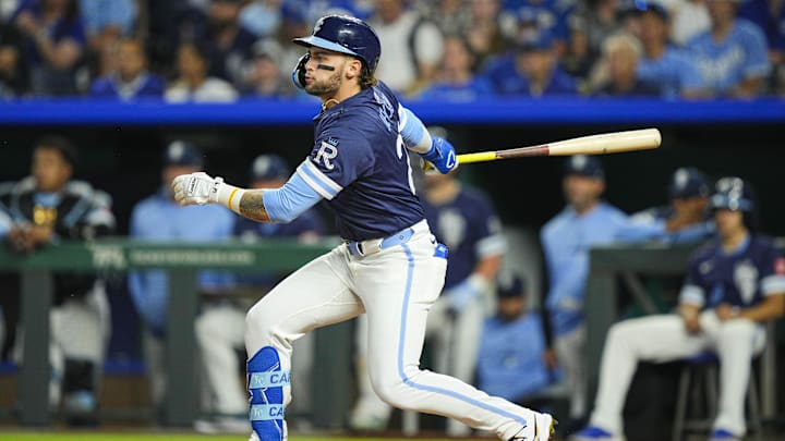 Sep 19, 2025; Kansas City, Missouri, USA; Kansas City Royals designated Carter Jensen (22) hits an RBI double during the third inning against the Toronto Blue Jays at Kauffman Stadium. Mandatory Credit: Jay Biggerstaff-Imagn Images