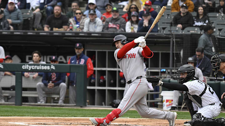 Apr 13, 2025; Chicago, Illinois, USA; Boston Red Sox third base Alex Bregman (2) singles against the Chicago White Sox during the first inning at Guaranteed Rate Field. Mandatory Credit: Matt Marton-Imagn Images