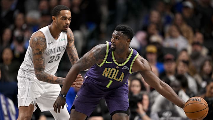 Feb 21, 2025; Dallas, Texas, USA; New Orleans Pelicans forward Zion Williamson (1) looks to move the ball past Dallas Mavericks forward P.J. Washington (25) during the second half at the American Airlines Center. Mandatory Credit: Jerome Miron-Imagn Images Feb 21, 2025; Dallas, Texas, USA; New Orleans Pelicans forward Zion Williamson (1) looks to move the ball past Dallas Mavericks forward P.J. Washington (25) during the second half at the American Airlines Center. Mandatory Credit: Jerome Miron-Imagn Images