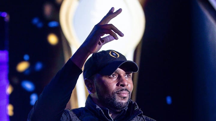 Michigan offensive coordinator Sherrone Moore is introduced during the national championship
