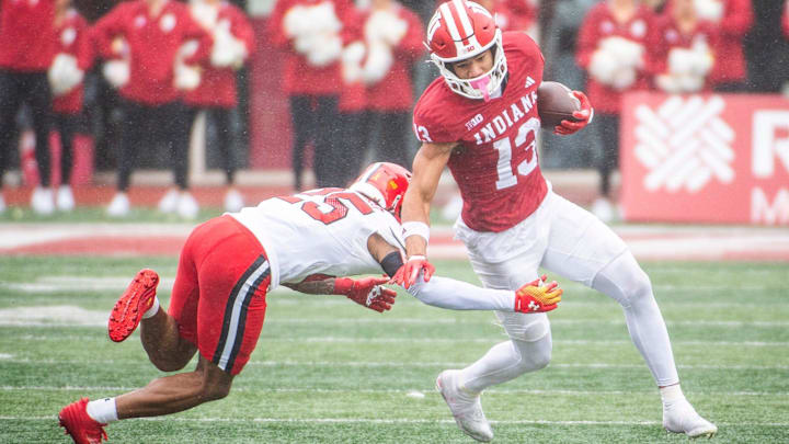Indiana's Elijah Sarratt (13) runs after the catch during the Indiana versus Maryland football game at Memorial Stadium on Saturday, Sept. 28, 2024.