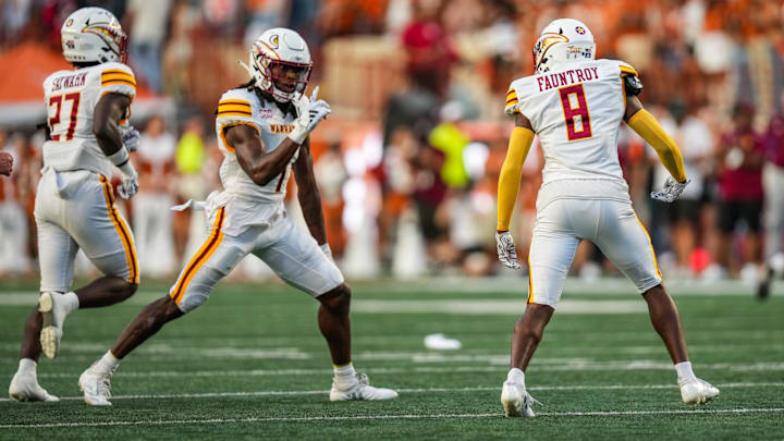 Louisiana Monroe Warhawks cornerback Car'lin Vigers (1) and Louisiana Monroe Warhawks defensive back Carl Fauntroy (8) celebrate after intercepting the ball as the Texas Longhorns take on ULM at Darrell K Royal-Texas Memorial Stadium in Austin Saturday, Sept. 21, 2024. Louisiana Monroe Warhawks cornerback Car'lin Vigers (1) and Louisiana Monroe Warhawks defensive back Carl Fauntroy (8) celebrate after intercepting the ball as the Texas Longhorns take on ULM at Darrell K Royal-Texas Memorial Stadium in Austin Saturday, Sept. 21, 2024.